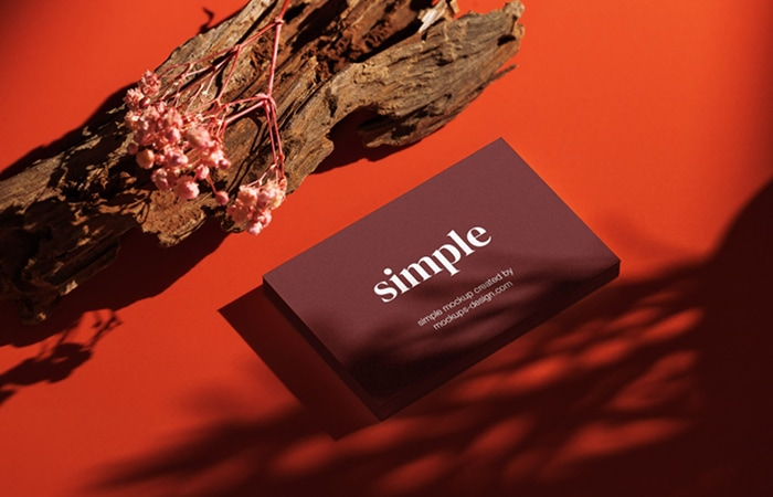 Business Card on Red Background Mockup