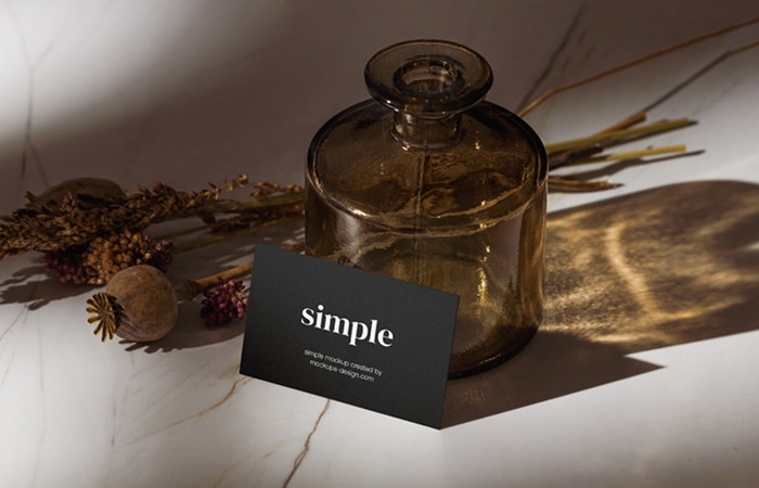 Business Card with Marble and Bottle Mockup
